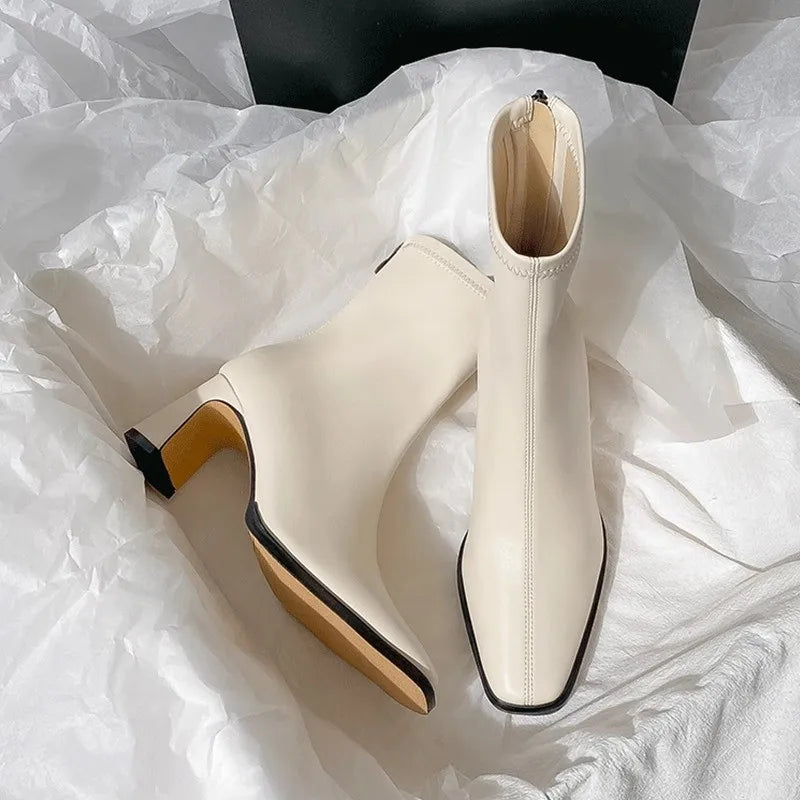 Stella Zipper Ankle Boots by Tom Claren